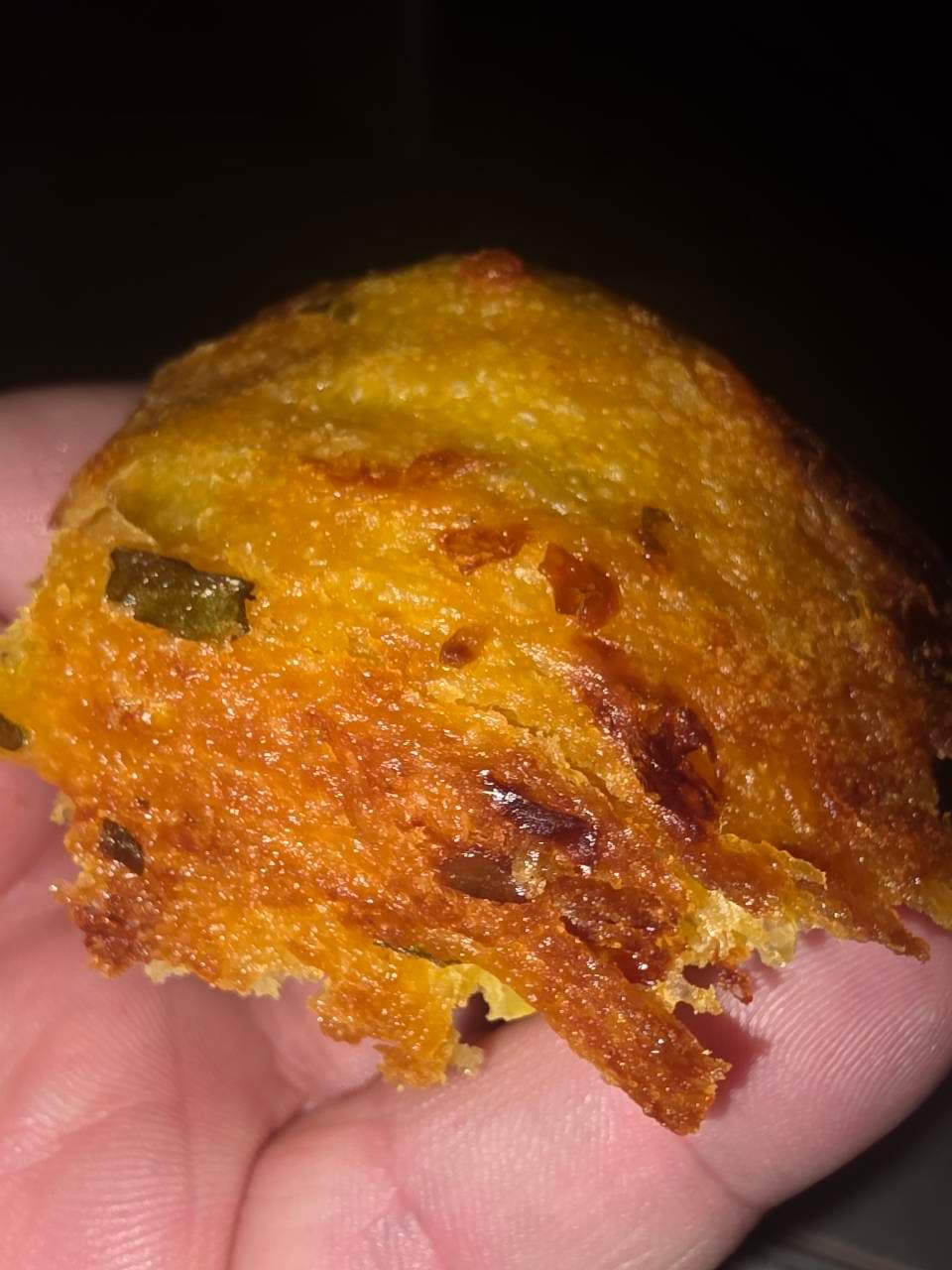 Focaccia made with tumeric. Home grown tomatoes garlic and basil from our garden (1/4)