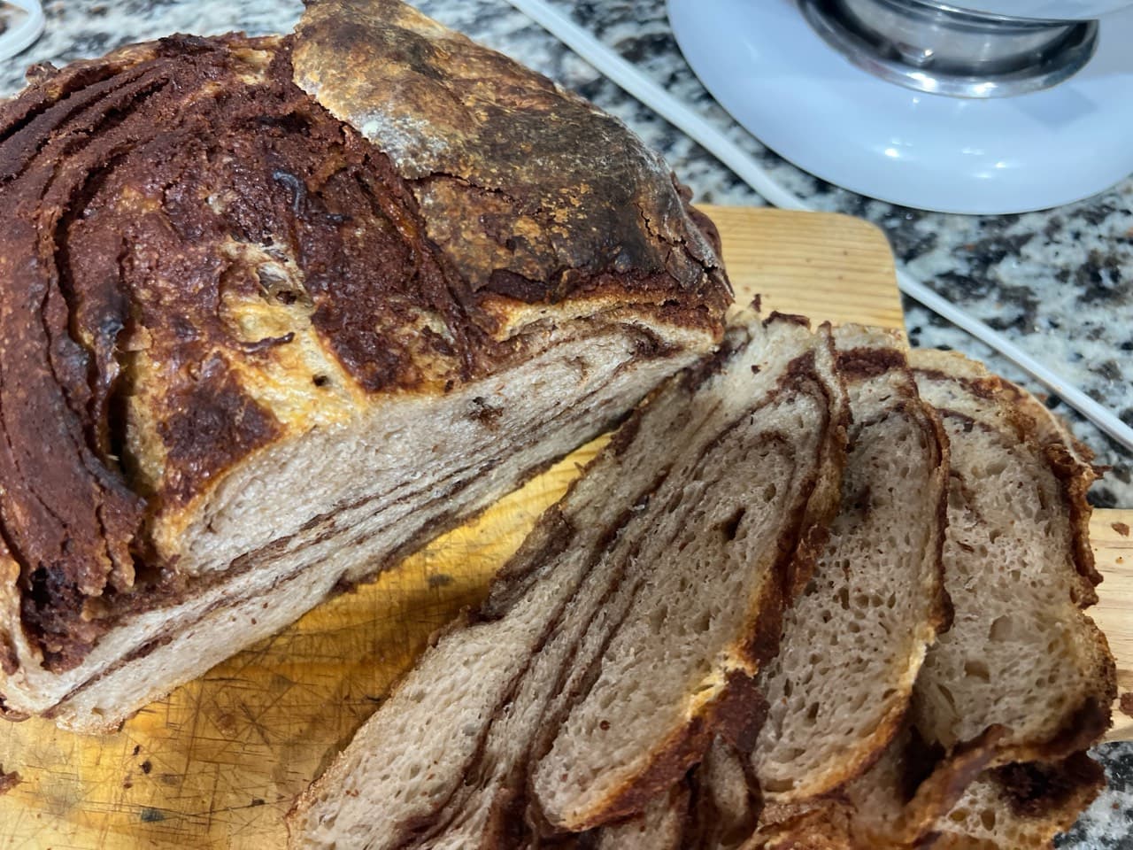 My first attempt for cinnamon swirl sourdough bread don’t know if it’s my dough (2/2)